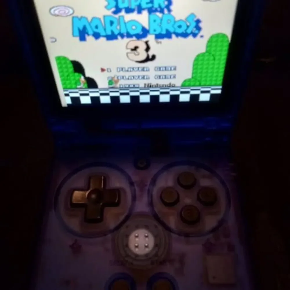 anbernic rg35xxsp blue transparent loaded with most retro platforms 256gb silic